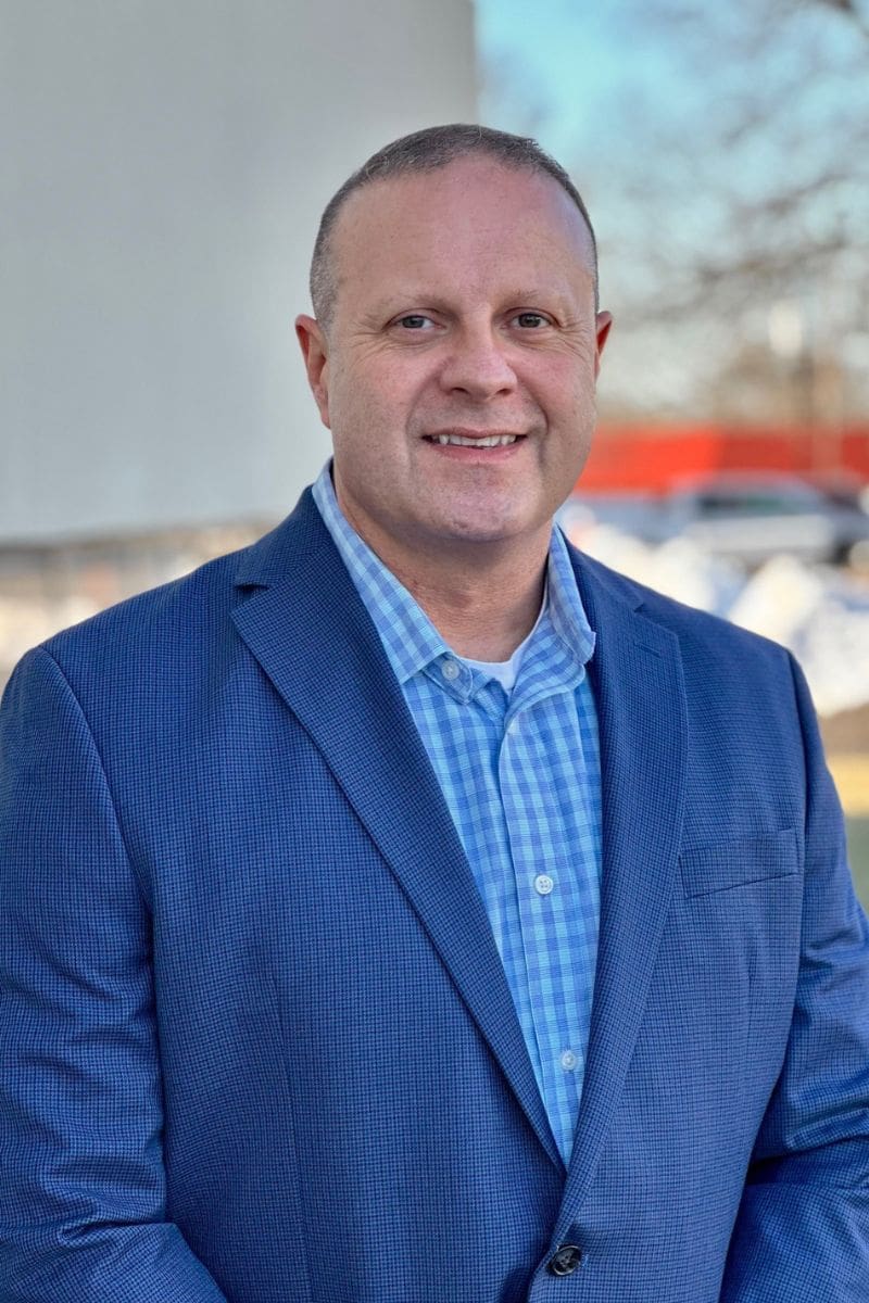 A photo of Chris Boster outside TP4 Advisors.