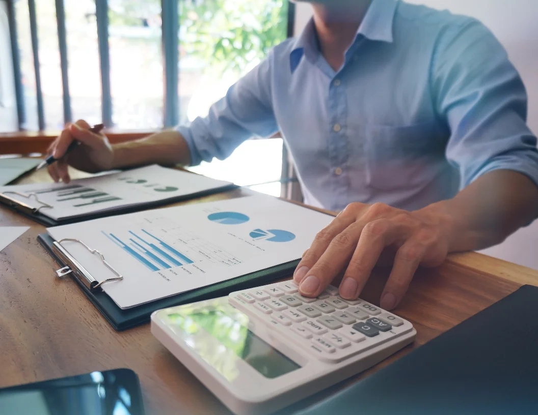man working reports desk man working reports desk